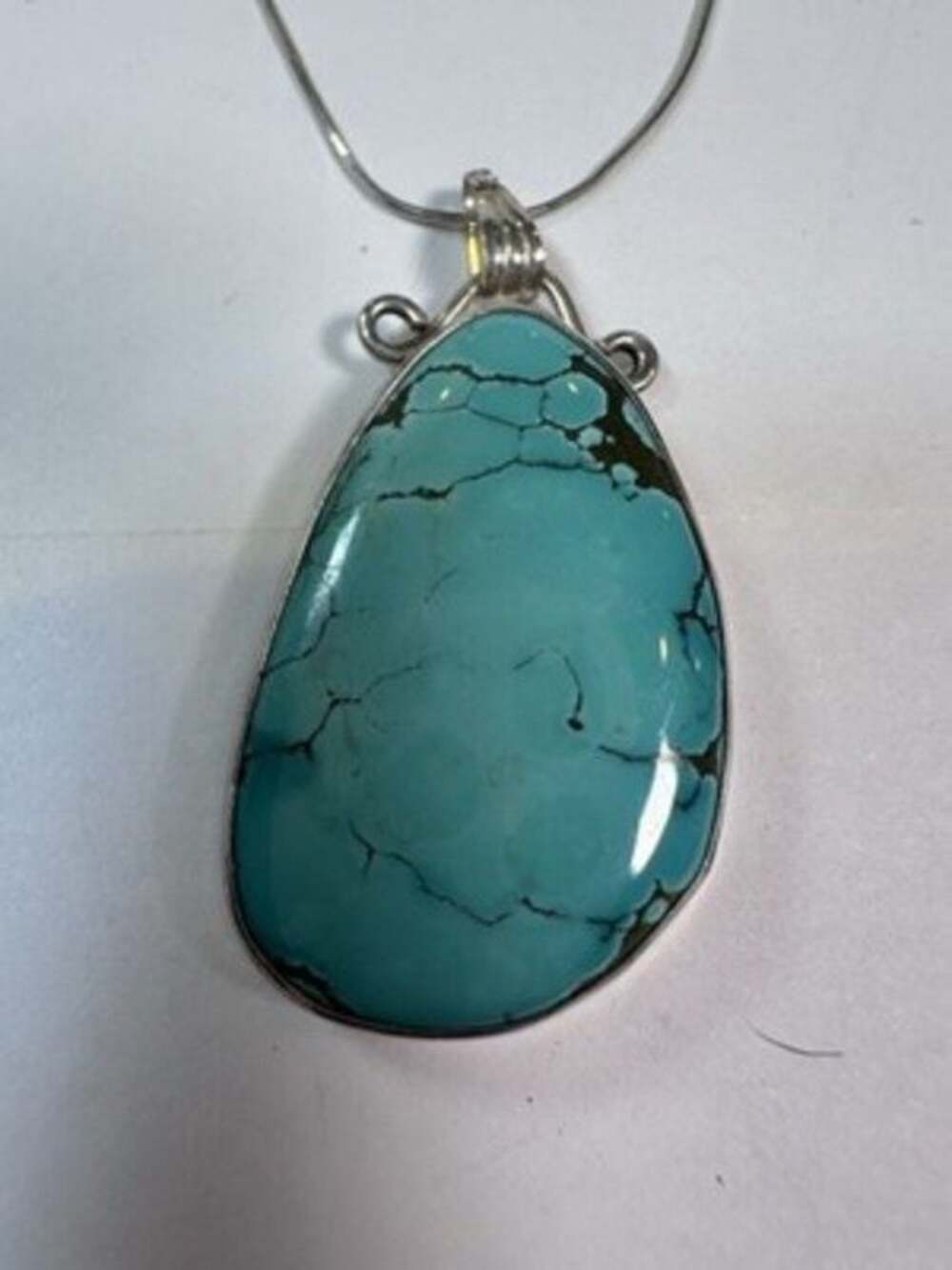 Vintage TaxcoNavajo turquoise pendant,spiderweb matrix rope bezel sterlingsilver